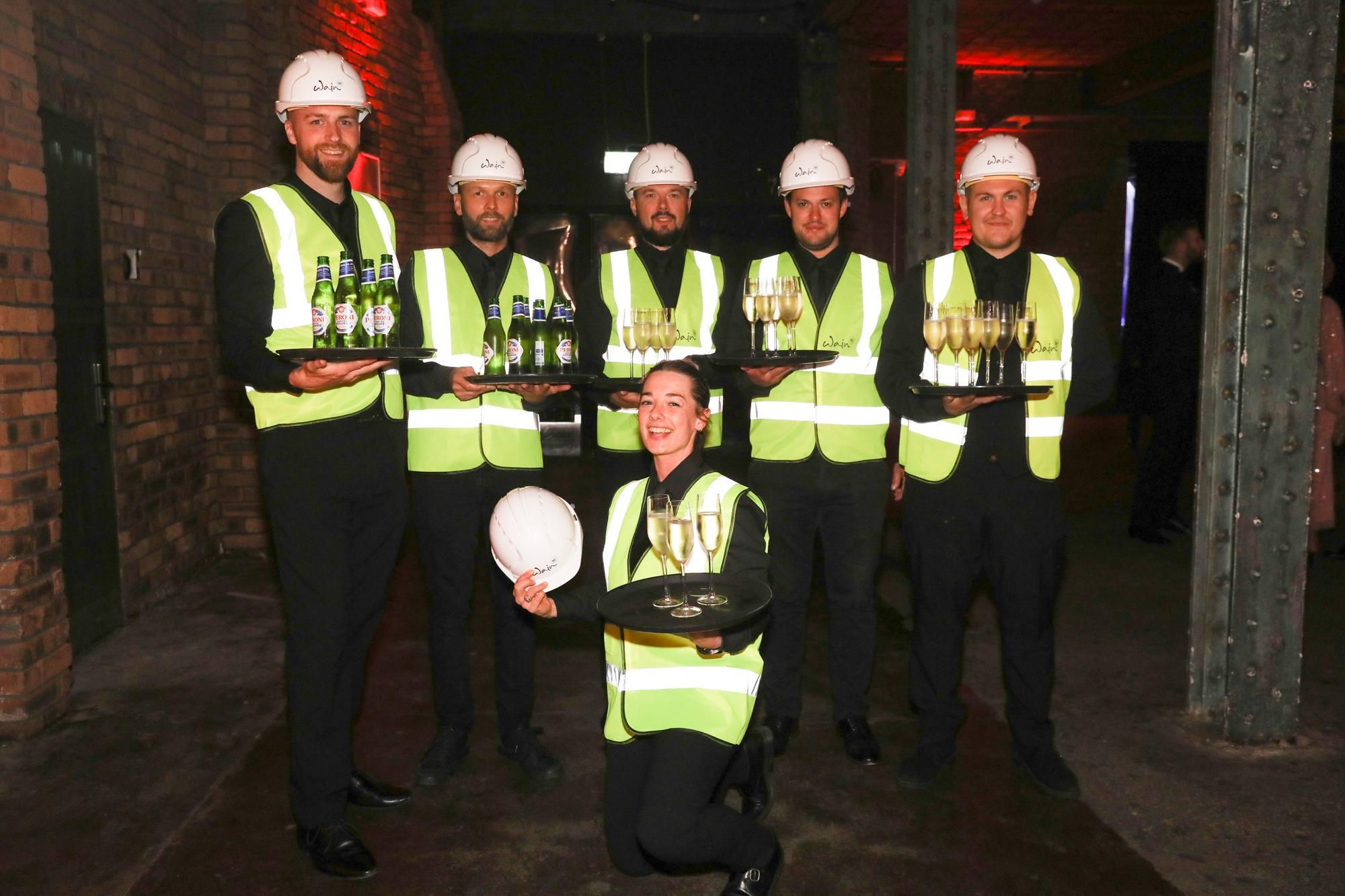 Wain Estates team in high vis jackets with drinks